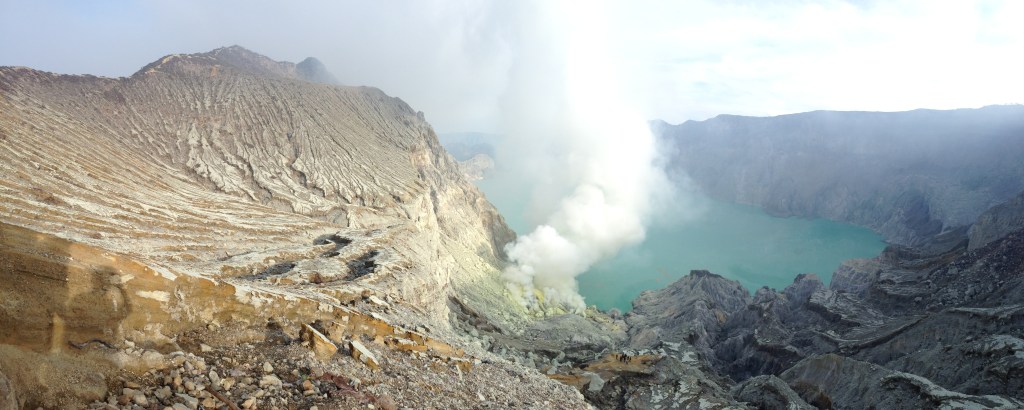 Panoramic view of Sulphuric fumes bursting through the crevices at Mount Ijen
