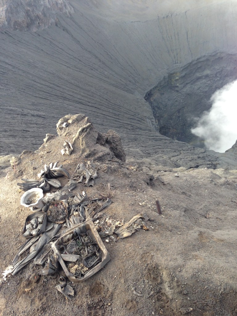 Religious offering to mount bromo by hindu shamans