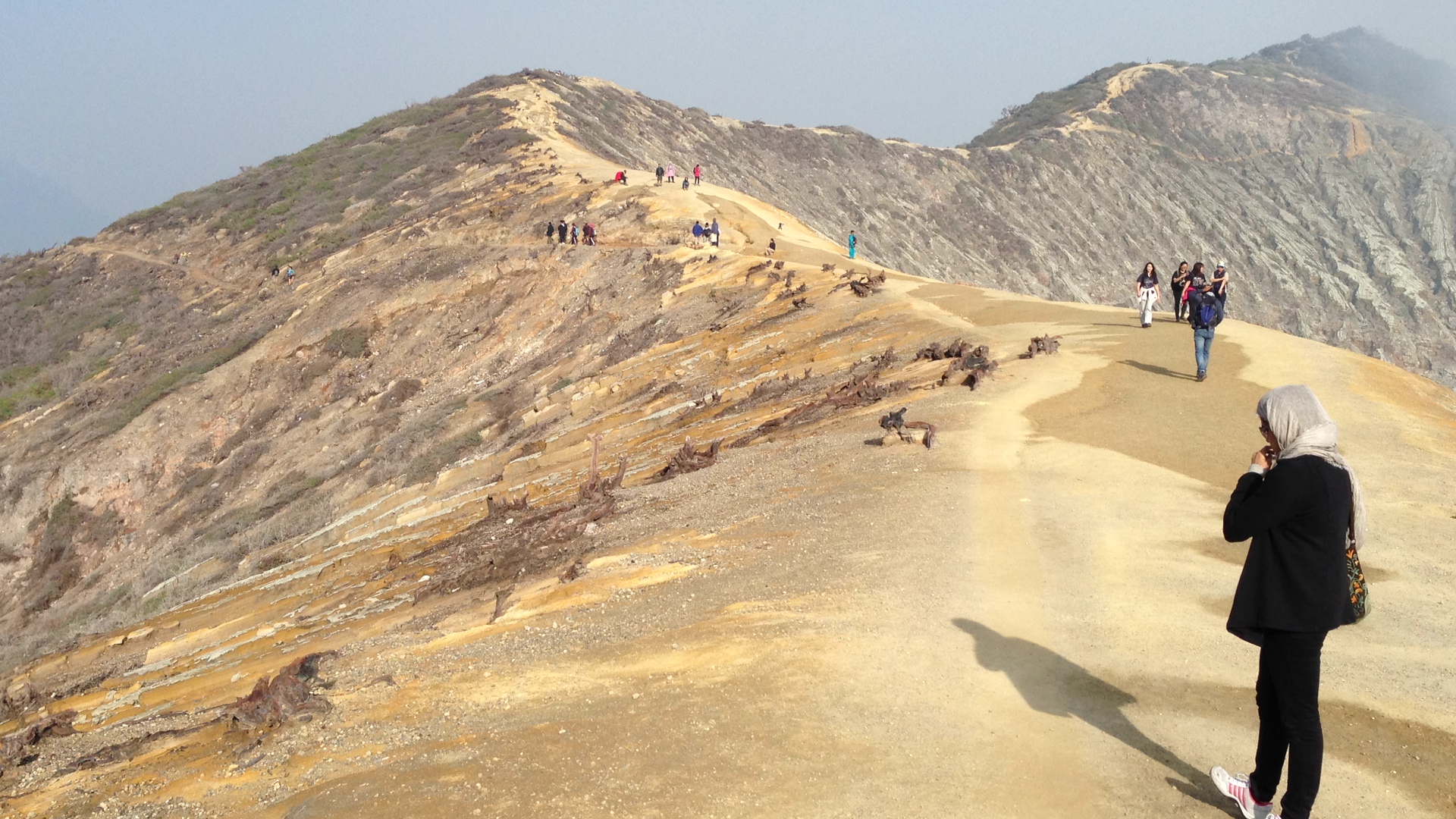 Desolation at the crater rim Mount Ijen